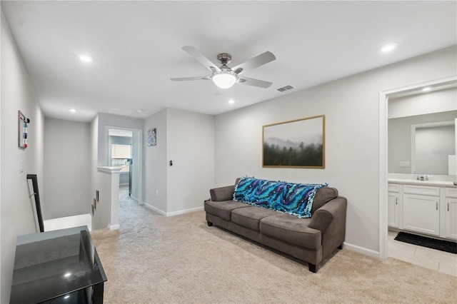 2529 Arbor Wind Dr, Lutz, FL 33558 - living area featuring light colored carpet, a ceiling fan, recessed lighting, and baseboards