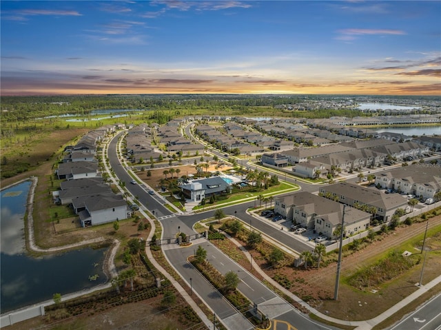 2529 Arbor Wind Dr, Lutz, FL 33558 - aerial view of property's location with a nearby body of water and nearby suburban area