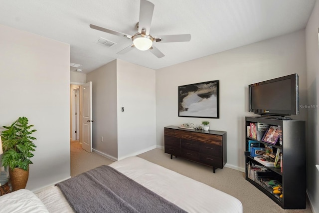 2529 Arbor Wind Dr, Lutz, FL 33558 - bedroom featuring light carpet, baseboards, and a ceiling fan