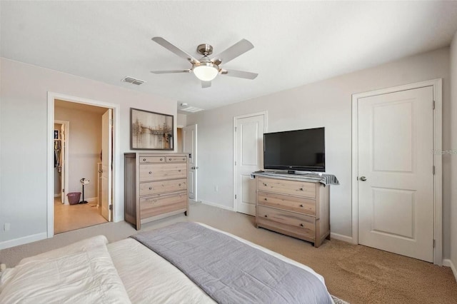 2529 Arbor Wind Dr, Lutz, FL 33558 - bedroom featuring baseboards, light colored carpet, a ceiling fan, and ensuite bath
