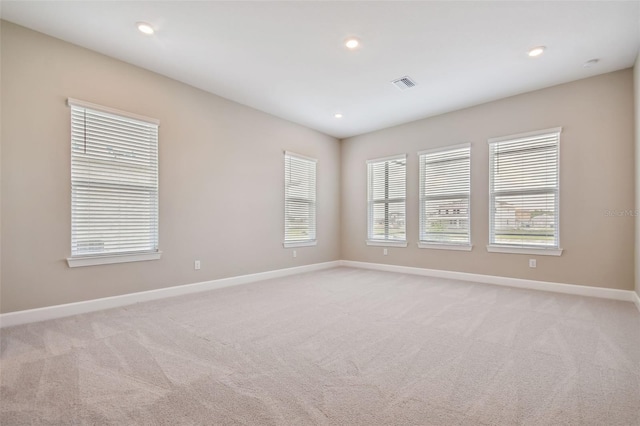 34084 Torrent Ln, Wesley Chapel, FL 33543 - unfurnished room featuring baseboards, light colored carpet, and recessed lighting