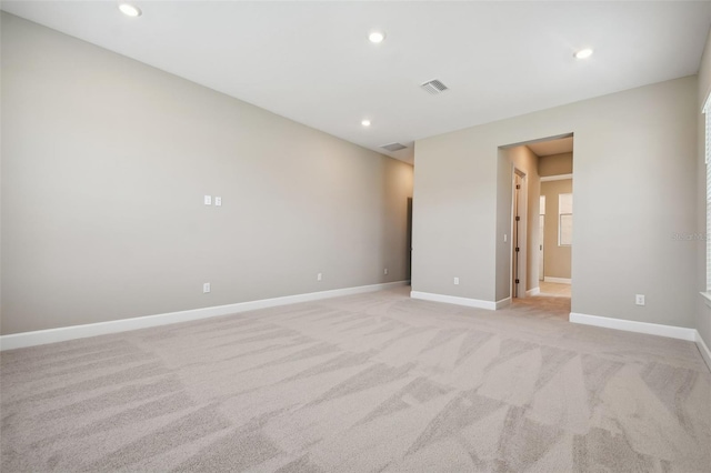 34084 Torrent Ln, Wesley Chapel, FL 33543 - empty room featuring light colored carpet, baseboards, and recessed lighting