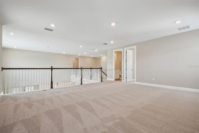 34084 Torrent Ln, Wesley Chapel, FL 33543 - empty room with light carpet, baseboards, and recessed lighting