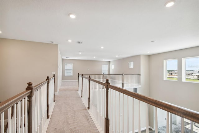 34084 Torrent Ln, Wesley Chapel, FL 33543 - corridor with an upstairs landing, recessed lighting, light colored carpet, and baseboards