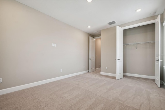 34084 Torrent Ln, Wesley Chapel, FL 33543 - unfurnished bedroom with light carpet, baseboards, recessed lighting, and a closet