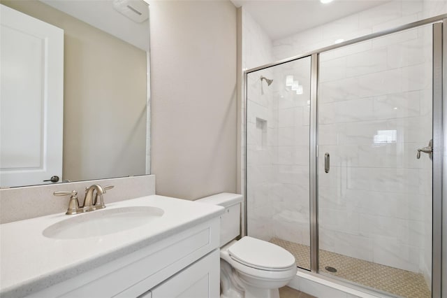 34084 Torrent Ln, Wesley Chapel, FL 33543 - bathroom with a shower stall, toilet, and vanity