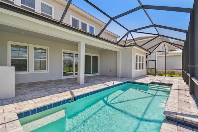 34084 Torrent Ln, Wesley Chapel, FL 33543 - swimming pool featuring a patio area and glass enclosure
