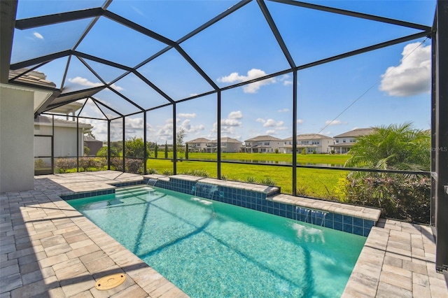 34084 Torrent Ln, Wesley Chapel, FL 33543 - swimming pool with a patio, a residential view, a lawn, and a lanai