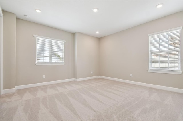 34084 Torrent Ln, Wesley Chapel, FL 33543 - empty room featuring light colored carpet, recessed lighting, and a smoke detector