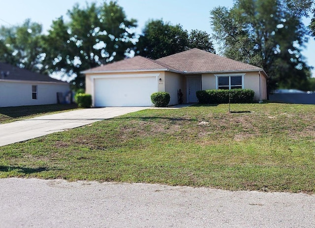 557 Windermere Dr, Lehigh Acres, FL 33972 - single story home with stucco siding, driveway, an attached garage, and a front yard
