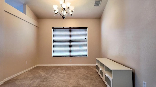 13653 Artesa Bell Dr, Riverview, FL 33579 - unfurnished room featuring a chandelier, light carpet, and baseboards