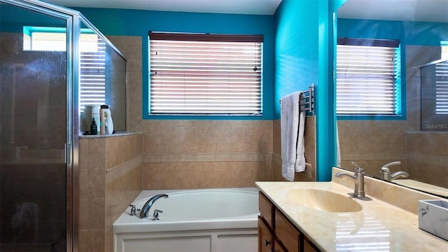 13653 Artesa Bell Dr, Riverview, FL 33579 - full bath featuring a shower stall, vanity, and a garden tub
