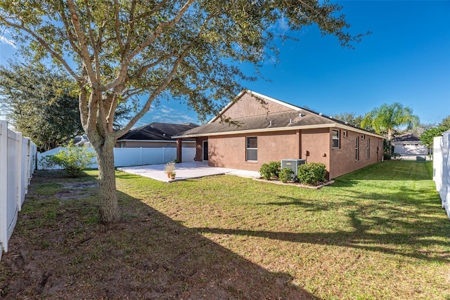 13653 Artesa Bell Dr, Riverview, FL 33579 - rear view of property with a patio, stucco siding, and cooling unit