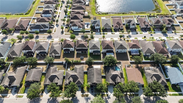 13653 Artesa Bell Dr, Riverview, FL 33579 - aerial view of property's location with nearby suburban area and a large body of water