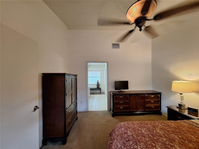 carpeted bedroom featuring a ceiling fan