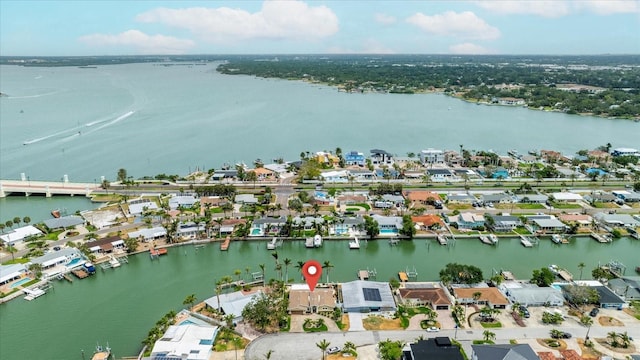 bird's eye view with a water view and a residential view