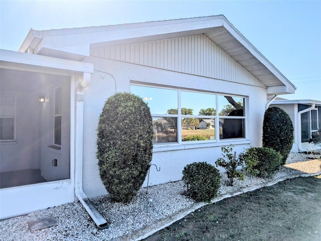 view of home's exterior with stucco siding