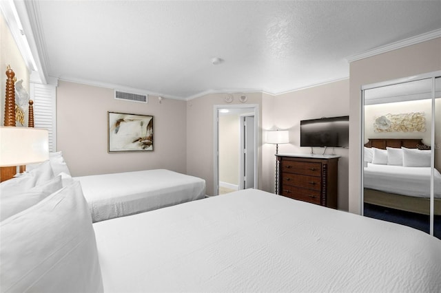 bedroom featuring crown molding