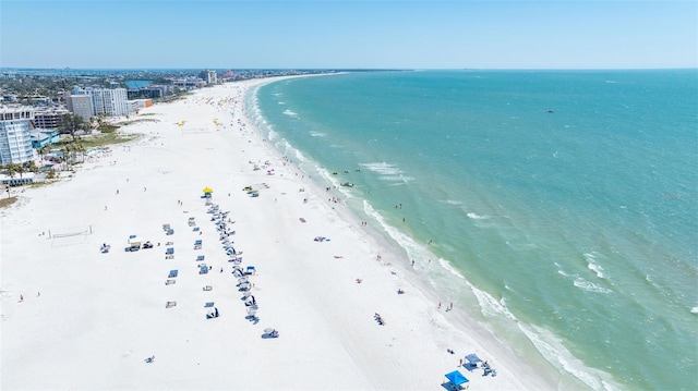drone / aerial view of waterfront with a beach