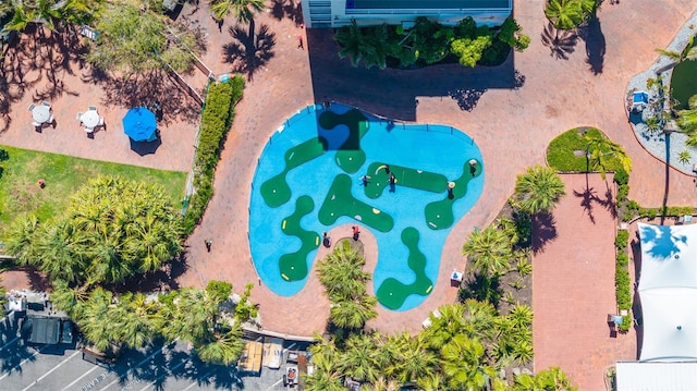 drone / aerial view of a pool area