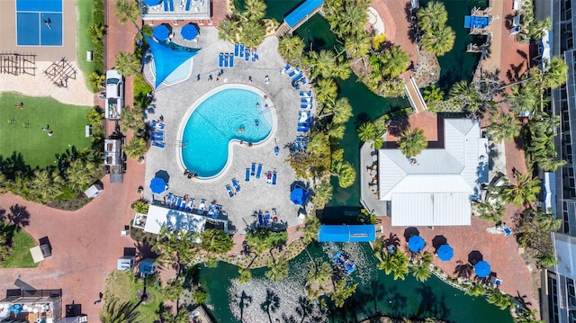 aerial view of property's location with a pool