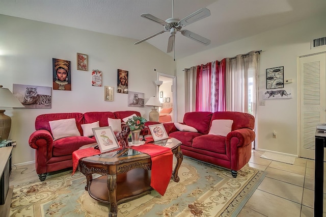 56 Pine Trak Unit 101E, Ocala, FL 34472 - living room featuring a ceiling fan, baseboards, vaulted ceiling, and tile patterned flooring