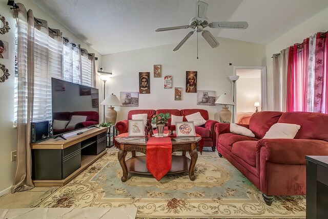 56 Pine Trak Unit 101E, Ocala, FL 34472 - living room featuring ceiling fan and vaulted ceiling