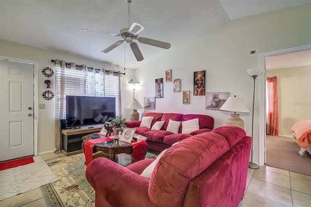 56 Pine Trak Unit 101E, Ocala, FL 34472 - living area with light tile patterned floors, vaulted ceiling, and a ceiling fan
