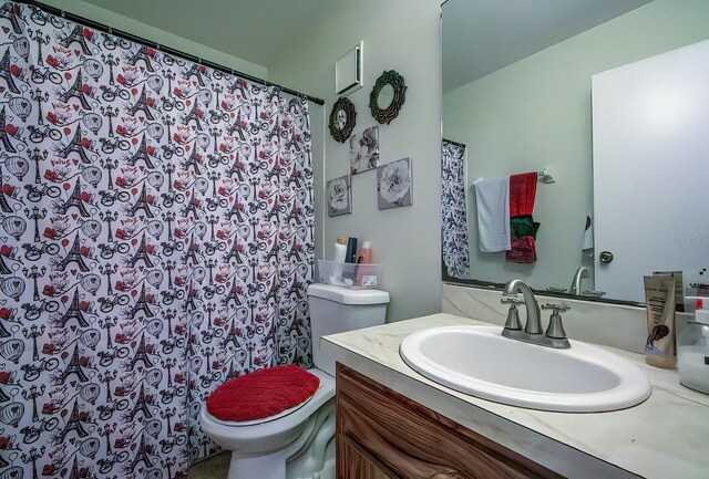 56 Pine Trak Unit 101E, Ocala, FL 34472 - full bathroom featuring vanity, a shower with curtain, and toilet