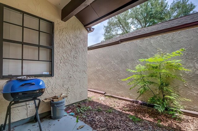56 Pine Trak Unit 101E, Ocala, FL 34472 - exterior details featuring stucco siding
