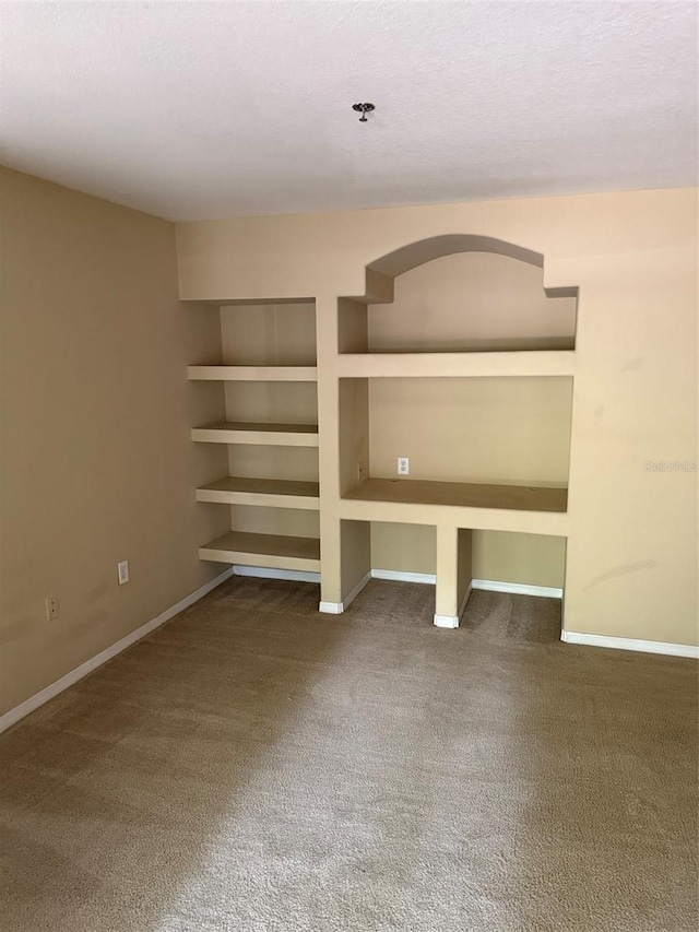 8517 Island Breeze Ln Unit 106, Temple Terrace, FL 33637 - unfurnished bedroom featuring baseboards and carpet