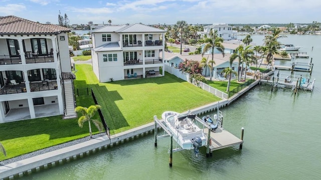 16025 Redington Dr, Redington Beach, FL 33708 - dock with boat lift, a balcony, a water view, and a residential view