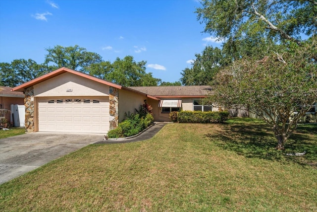 single story home featuring an attached garage, stone siding, driveway, stucco siding, and a front lawn