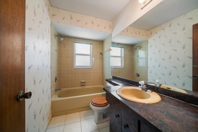 bathroom featuring toilet, vanity, tile patterned floors, bathtub / shower combination, and wallpapered walls