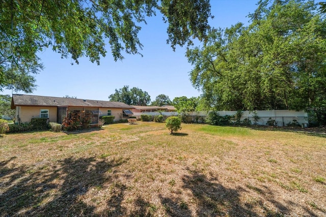 view of yard featuring fence