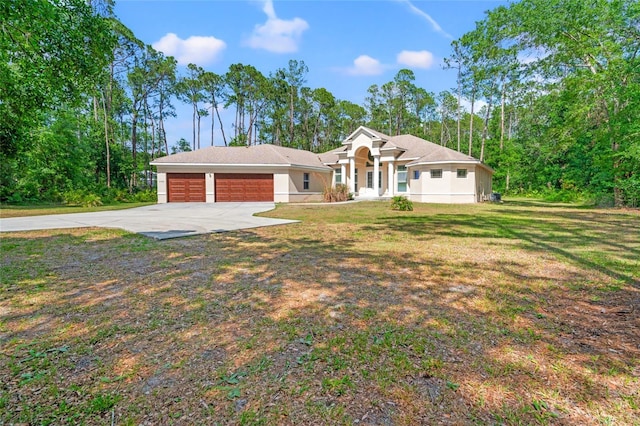 7340 W Dr, Wesley Chapel, FL 33544 - view of front facade featuring an attached garage, driveway, and a front lawn