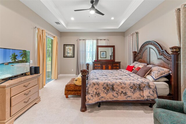 7340 W Dr, Wesley Chapel, FL 33544 - bedroom with a tray ceiling, ceiling fan, visible vents, light carpet, and access to exterior