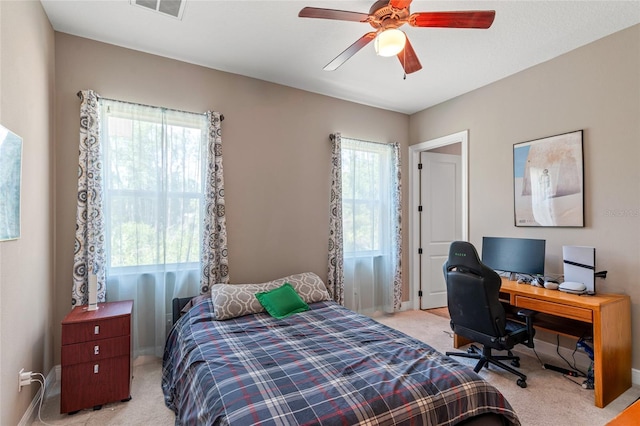 7340 W Dr, Wesley Chapel, FL 33544 - carpeted bedroom featuring baseboards, ceiling fan, and visible vents