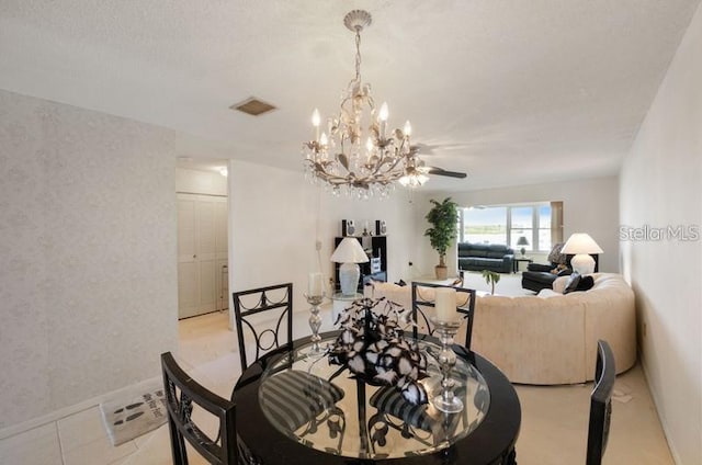 5925 Shore Blvd S Unit 602, Gulfport, FL 33707 - dining space featuring an inviting chandelier and visible vents