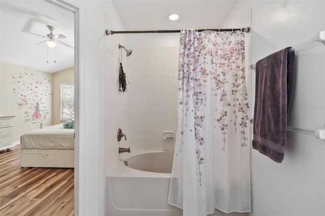 full bath featuring wood finished floors, a ceiling fan, shower / bath combo, ensuite bathroom, and recessed lighting