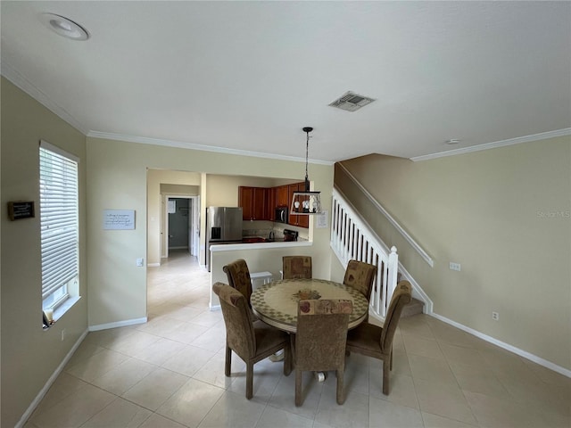 dining space with stairs, crown molding, baseboards, a chandelier, and light tile patterned flooring