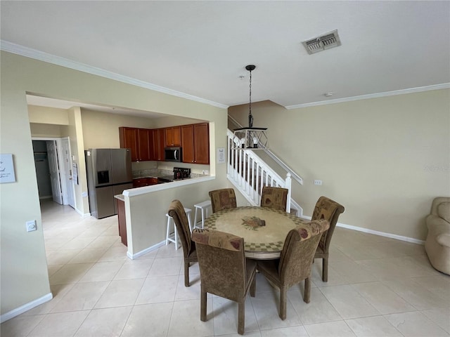 dining space with a chandelier, ornamental molding, baseboards, light tile patterned flooring, and stairs