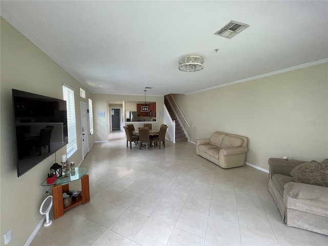living area with crown molding, stairway, baseboards, and light tile patterned floors