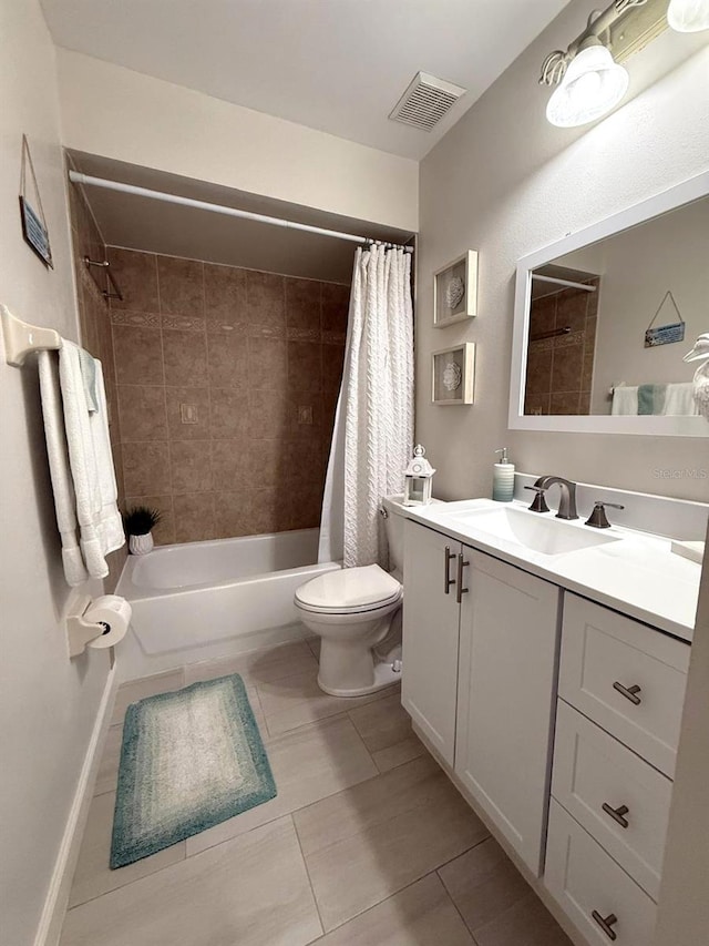 full bath featuring tile patterned flooring, vanity, shower / tub combo with curtain, toilet, and visible vents
