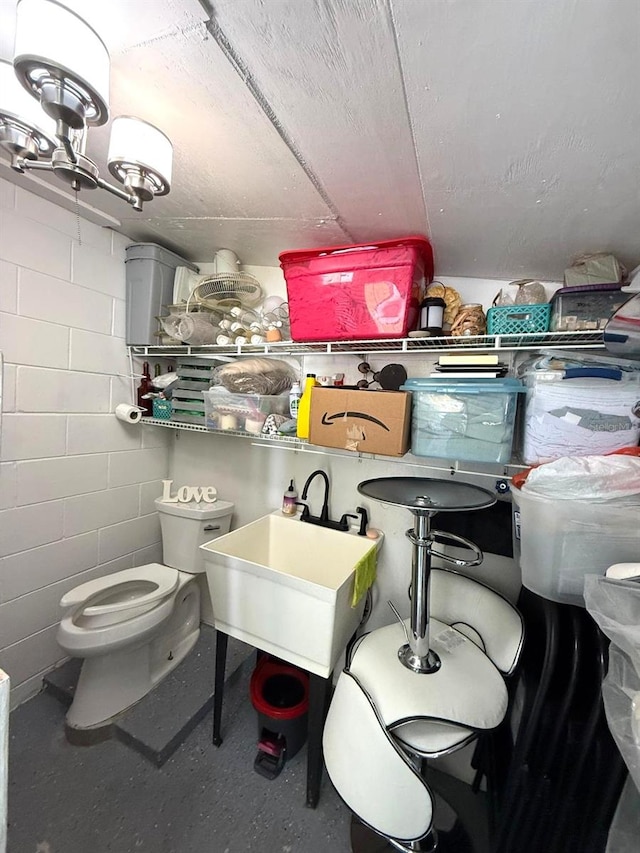 storage room featuring a sink
