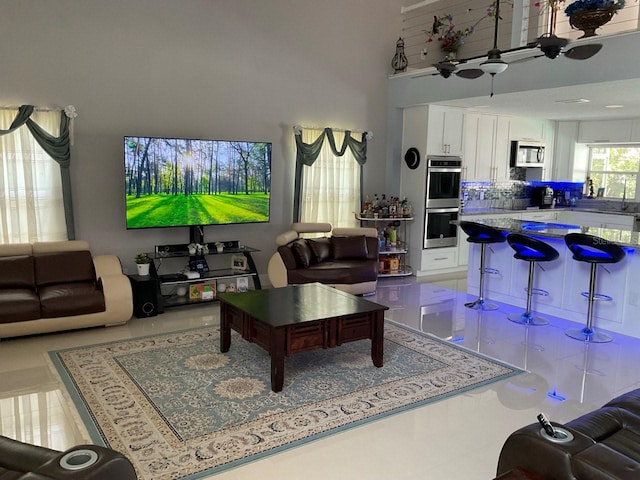 11727 Spanish Lake Dr, Tampa, FL 33635 - living room with tile patterned floors and a towering ceiling