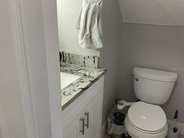11727 Spanish Lake Dr, Tampa, FL 33635 - half bath with toilet, baseboards, and vanity