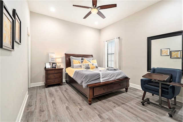 bedroom with ceiling fan, baseboards, light wood-type flooring, and recessed lighting