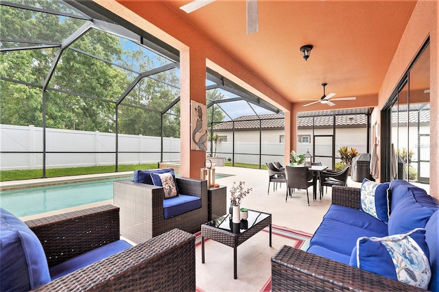 view of patio / terrace with an outdoor hangout area, outdoor dining area, a ceiling fan, and a fenced backyard