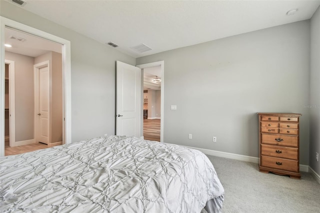 5670 Shorebird Br, Land O Lakes, FL 34638 - bedroom featuring baseboards and light colored carpet